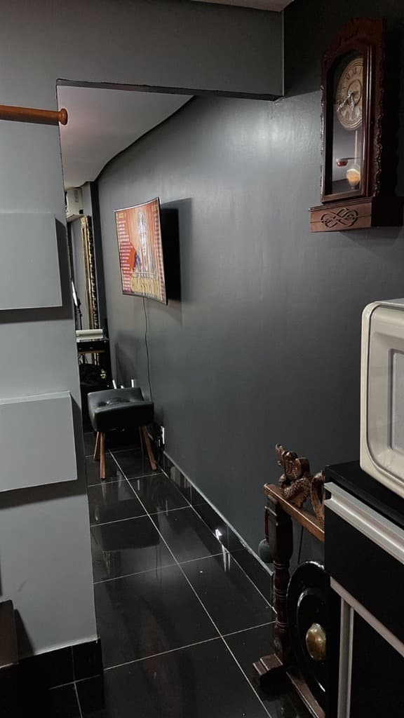 Corredor e recepção do estúdio